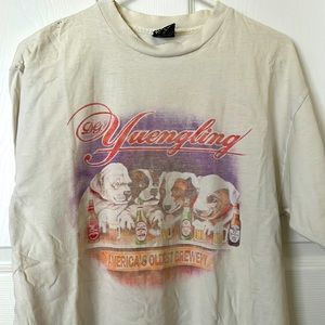 Yuengling beer company shirt.